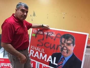 London-Fanshawe Liberal Candidate Khalil Ramal with one of his election vandalized election signs. October 7, 2015. Photo by Ashton Patis. 
