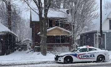 A police cruisers sits outside of 712 Adelaide St. N. after an overnight fire, February 3, 2023. (Photo by Rebecca Chouinard, Blackburn Media)