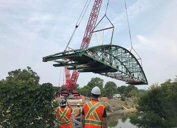 A large crane swings Blackfriars Bridge back onto its abutments above the Thames River, August 15, 2018. Photo courtesy of the City of London.