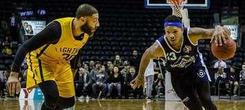 Royce White of the London Lightning (left) defends Billy White of the Halifax Hurricanes during the Lightning's 105-97 win in Game 1 of the NBLC Finals at Budweiser Gardens in London (Photo courtesy London Lightning/NBL Canada)