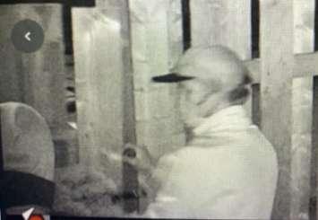 A surveillance image of two people entering a locked compound on Talbot Street. Photo courtesy of St. Thomas police. 