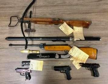 Weapons are displayed by St. Thomas Police following a drug raid on August 15, 2018. Photo provided by St. Thomas Police Service.