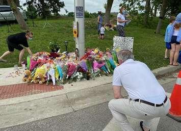 A memorial continues to grow at the corner of Hyde Park and South Carriage roads in honour of a Muslim family who was run down Sunday night, June 8, 2021. Photo by Blair  Henatyzen.