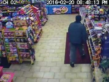 Surveillance photo of robbery suspect at Happy Days Variety Store provided by London police.
