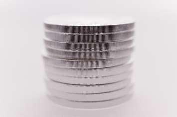 Silver coins file photo courtesy of © Can Stock Photo / 3quarks