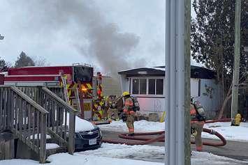London firefighters battle a fire at a mobile home at 2189 Dundas Street, February 6, 2023. Photo courtesy of the London Fire Department. 