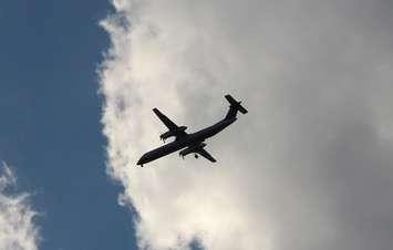 A passenger jet approaches Windsor International Airport for a landing, September 18 2014.  (Photo by Adelle Loiselle.)