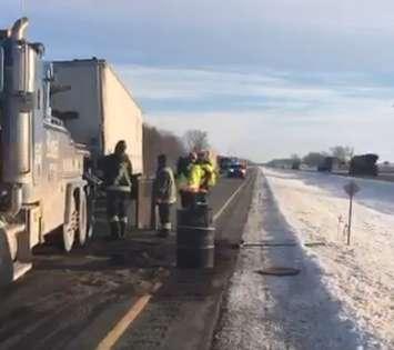 Crews work to tow the trailer from a transport truck that was involved in a crash on Hwy. 401 at Currie Rd., February 13, 2018. Photo courtesy of the OPP.