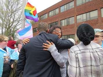 Students and school board officials celebrate the raising of the pride and transgender flags at the Thames Valley District School Board office on Dundas St., April 19, 2017. (Photo by Miranda Chant, Blackburn News.)