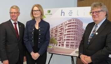 President of Sifton Properties Richard Sifton, London West MP Kate Young, and London Mayor Ed Holder stand in front of a rendering of the Helio highrise, January 22, 2019. (Photo by Miranda Chant, Blackburn News) 