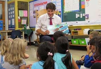 Liberal Leader Justin Trudeau reads to a Grade 1/2 class at Blessed Sacrament Catholic Elementary School in London, September 16, 2019. (Photo by Miranda Chant, Blackburn News)