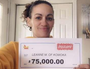 Leanne Mackenzie wins $75,000 off of an Instant Cash Word$ scratch ticket. (Photo courtesy of OLG)