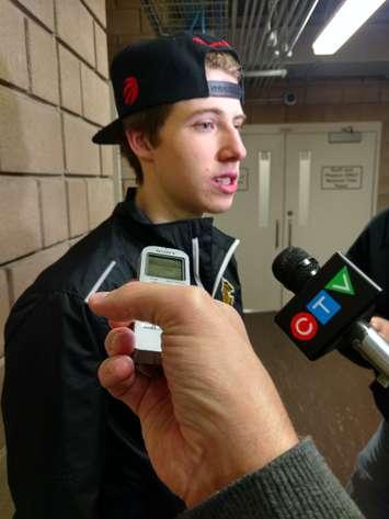 London Knights centre Mitchell Marner speaks with the media outside the visitors' dressing room at the WFCU Centre in Windsor on Nov. 29.  (PHOTO/Mark Brown)