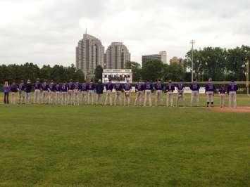 London Majors players line up along the third base line at Purple in the Park 2015. Photo courtesy of the London Abused Women's Centre. 